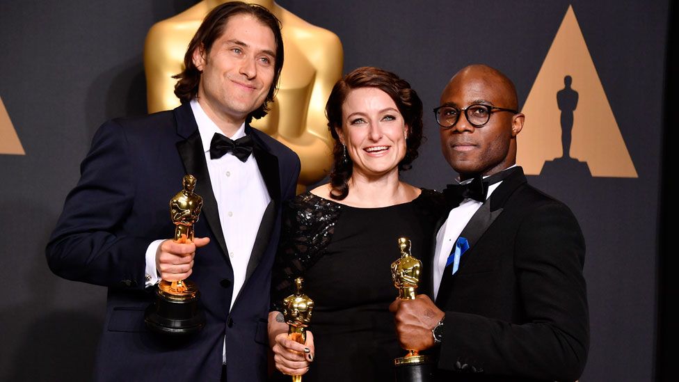 Moonlight producers Jeremy Kleiner and Adele Romanski with director Barry Jenkins