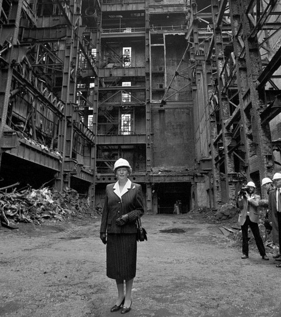 Margaret Thatcher stands in the shell of Battersea Power Station in 1988
