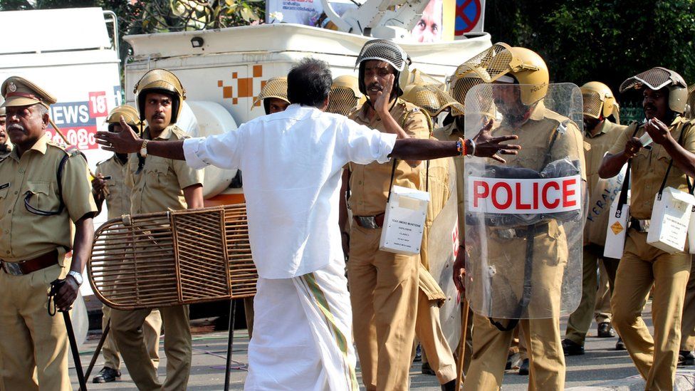 Indian Police patrol during clashes between Communist Party of India (Marxist) (CPM) and Bhartiya Janta Party (BJP) in front of the Kerala Government Secretariat in Thiruvnanthapuram on January 02, 2019