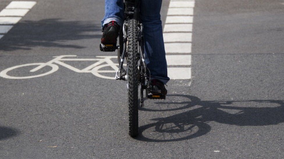 A cyclist in a bike lane