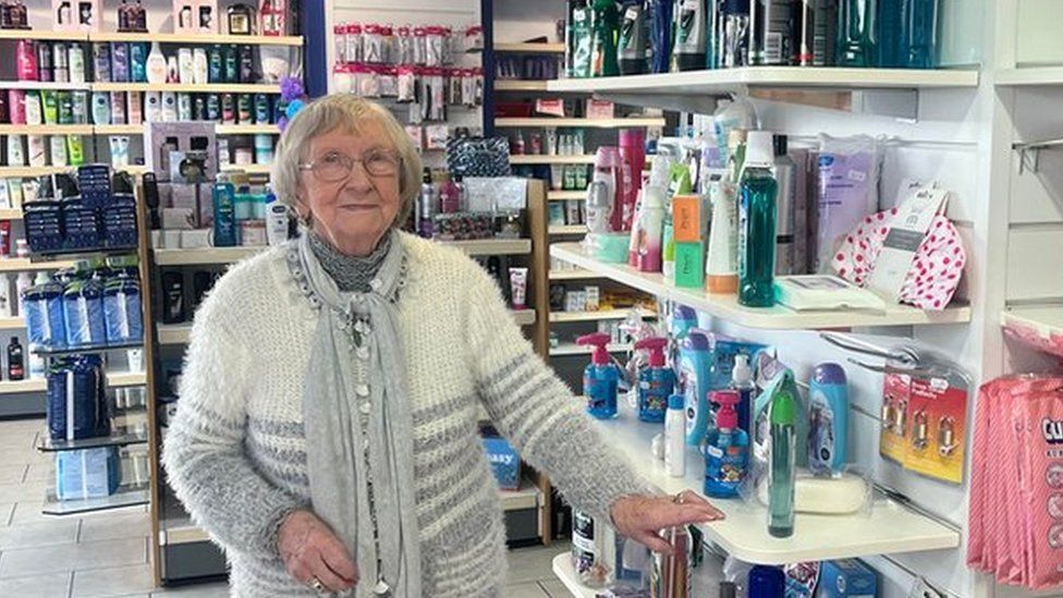 Betty Pritchard inside Watkin-Davies pharmacy