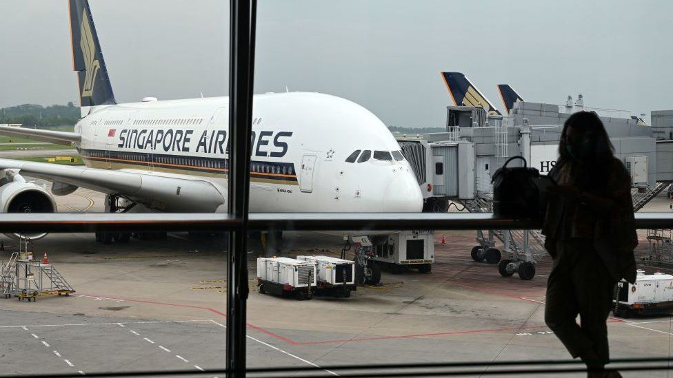 A Singapore Airlines Airbus A380 plane is seen parked on the tarmac at Changi International Airport in Singapore on October 24, 2020