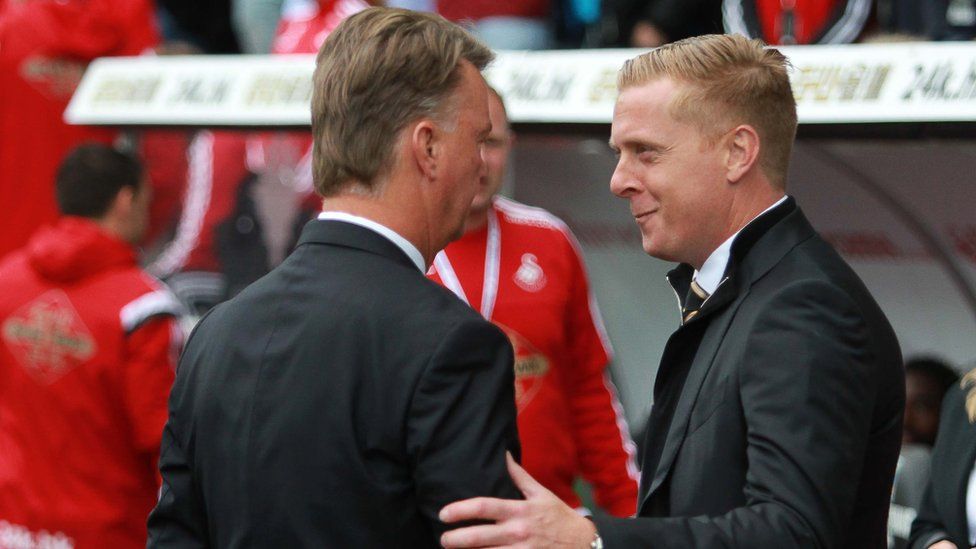 Swansea manager Garry Monk (R) with Manchester United boss Louis van Gaal
