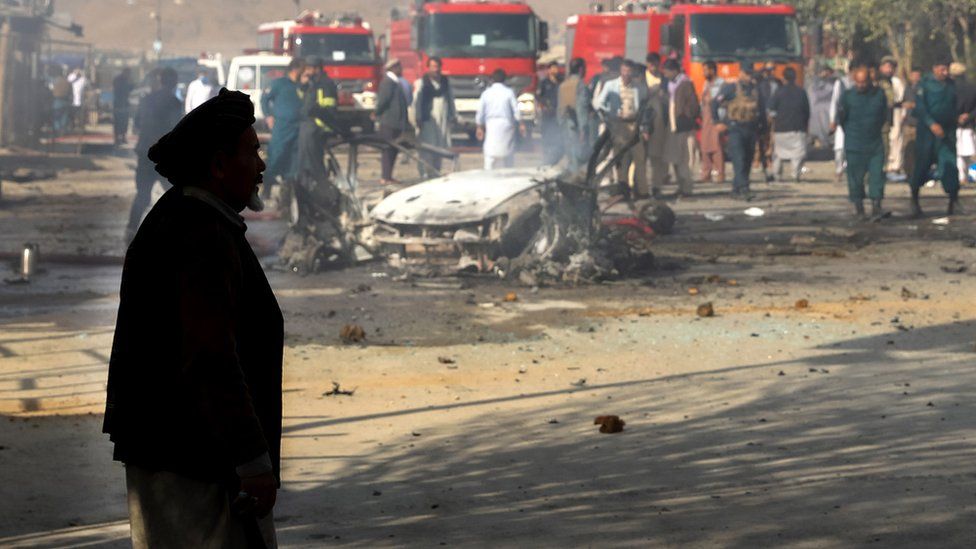 An Afghan man stands near the scene of blast in Kabul, Afghanistan, 27 October 2020.