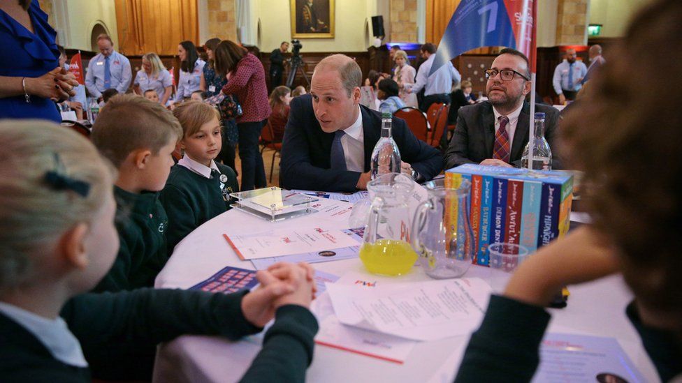 Prince William with children at the National SkillForce graduation ceremony