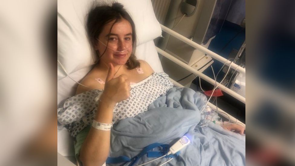 Mali Elwy in hospital bed