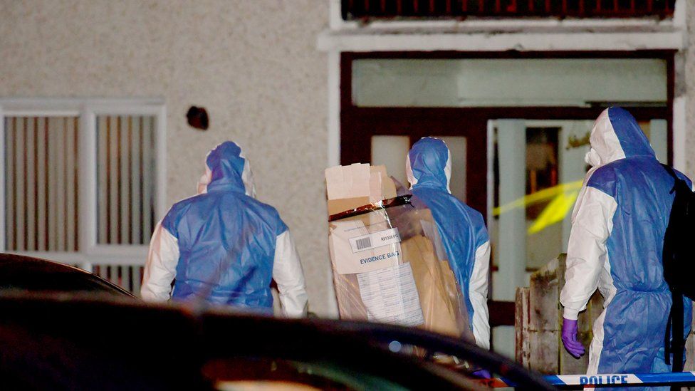 Forensic officers at the scene of Glenn Quinn's death in Carrickfergus in January 2020