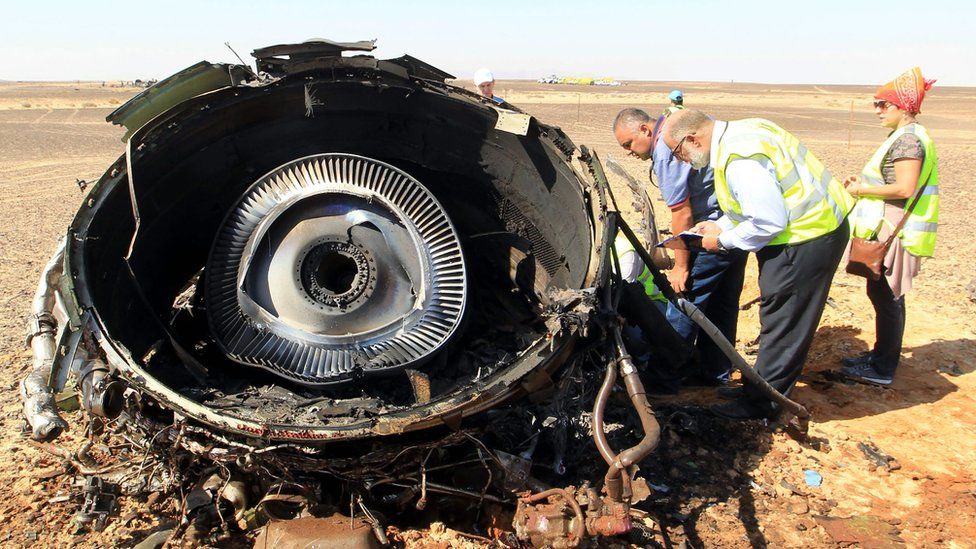Egyptian investigators check debris from crashed Russian jet in the Sinai