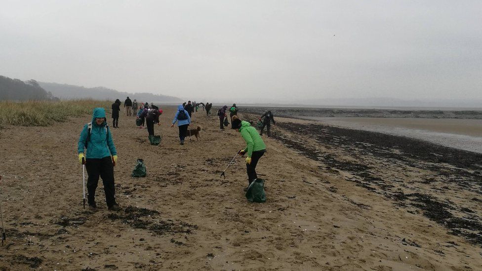 Beach cleaners at Cramond