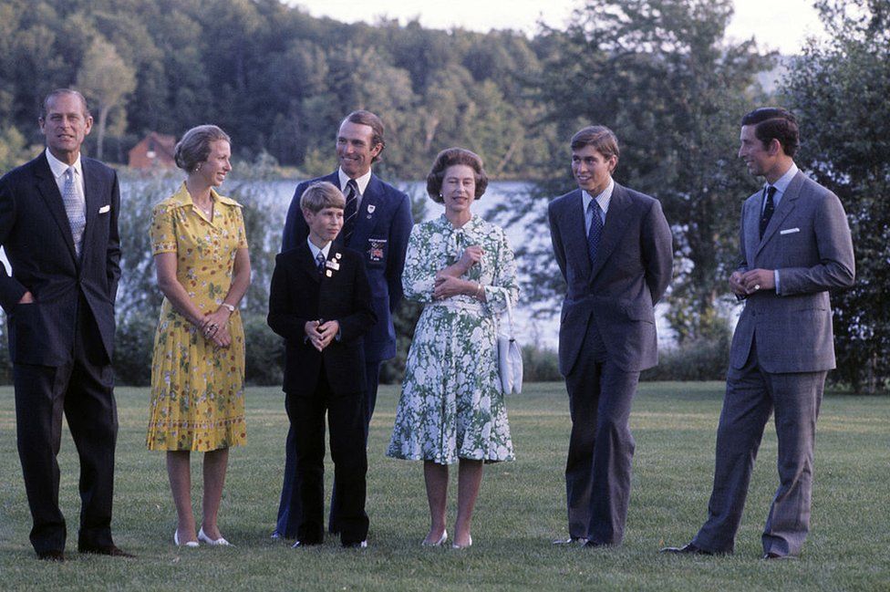 Prince Philip, Duke of Edinburgh and his family, Princess Anne, Princess Royal, Mark Phillips, Prince Edward, Earl of Wessex, Queen Elizabeth ll, Prince Andrew and Prince Charles, Prince of Wales pose together during the Olympic Games in 1976 July in Bromont, Canada.