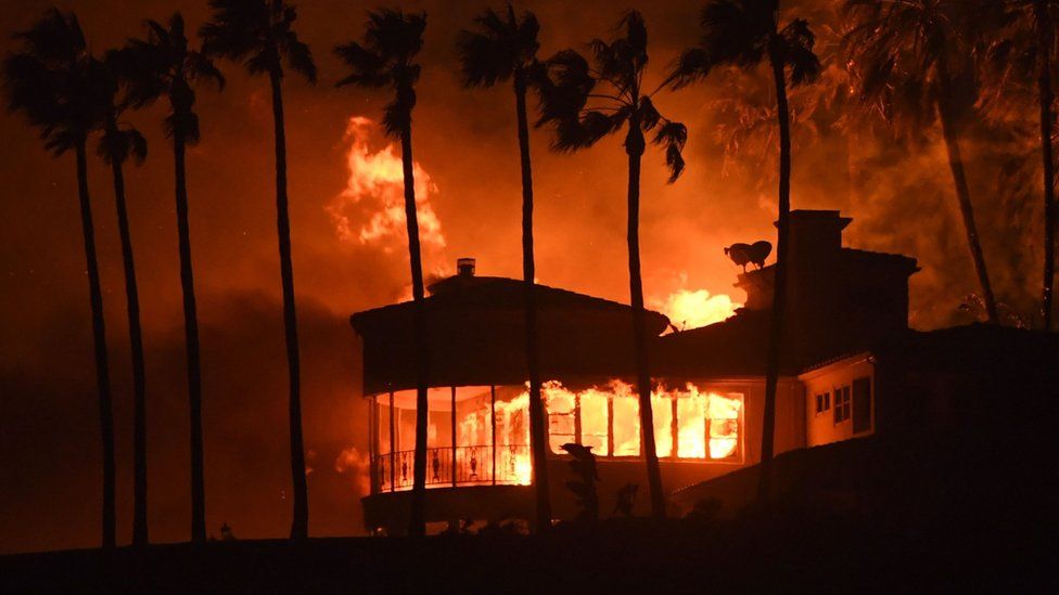 A house burns during the Woolsey Fire on November 9, 2018 in Malibu, California