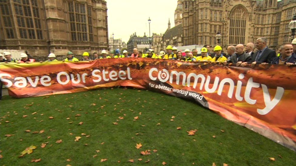 Steel workers unveil banner at Westminster