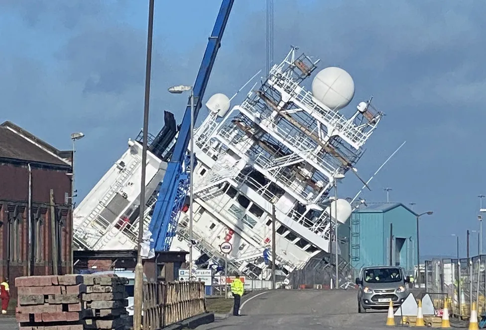 Multiple injuries after ship tips over at Edinburgh dockyard (bbc.com)