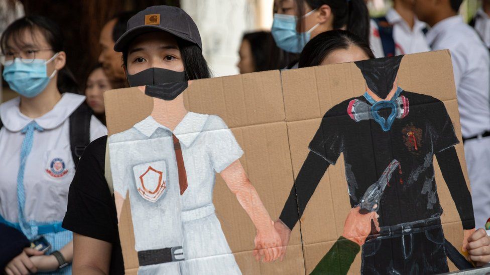 Students at Tsuen Wan Public Ho Chuen Yiu Memorial College show solidarity with the shot protester