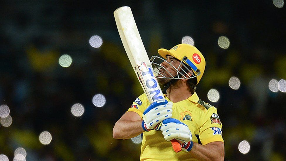Chennai Super Kings' captain Mahendra Singh Dhoni watches the ball after playing a shot during the IPL match on April 3