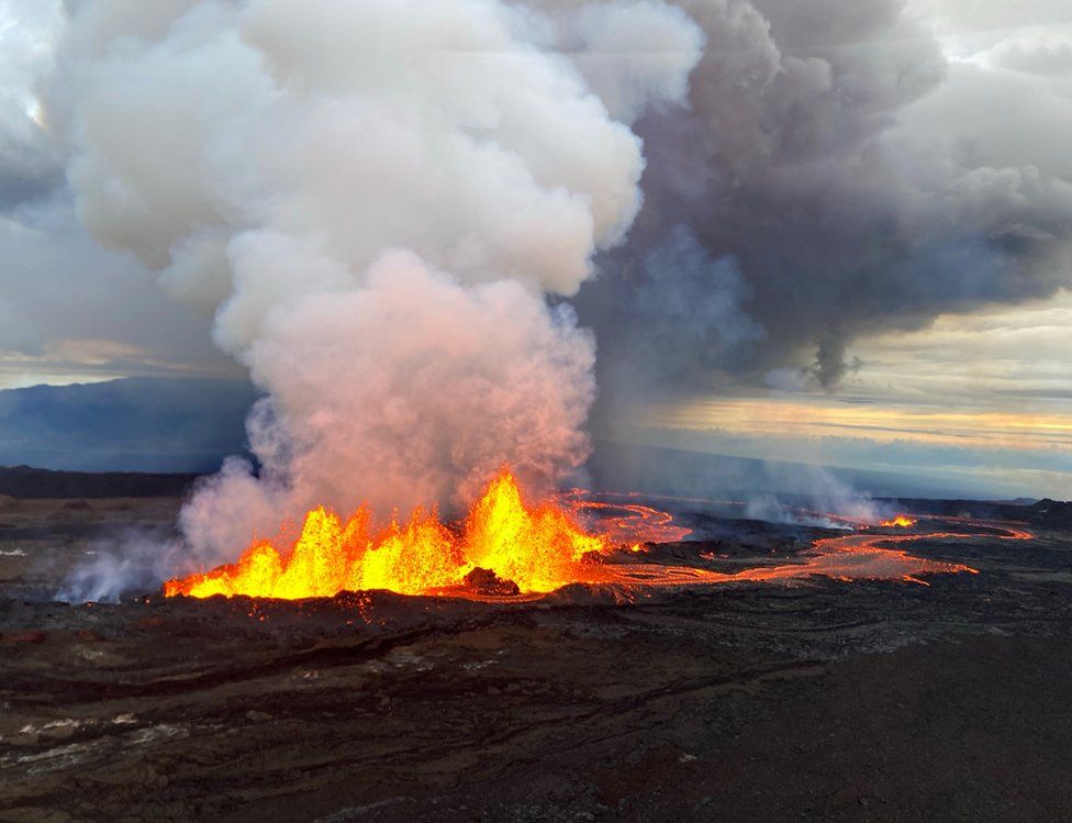 Aerial view of fissure 3 fountains of lava erupting on the Northeast Rift Zone summit of Mauna Loa volcano in Hawaii, U.S. November 29, 2022.