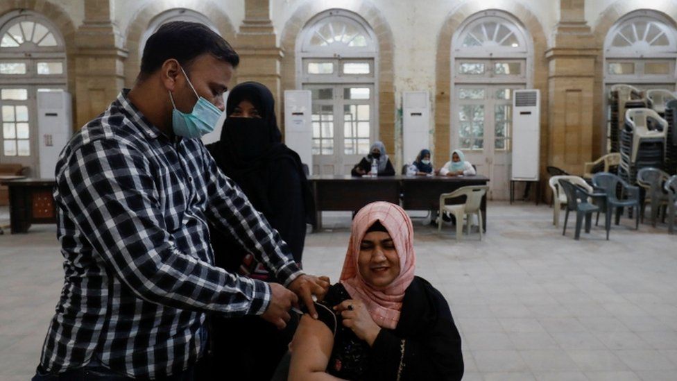 Woman given vaccine in Karachi, Pakistan