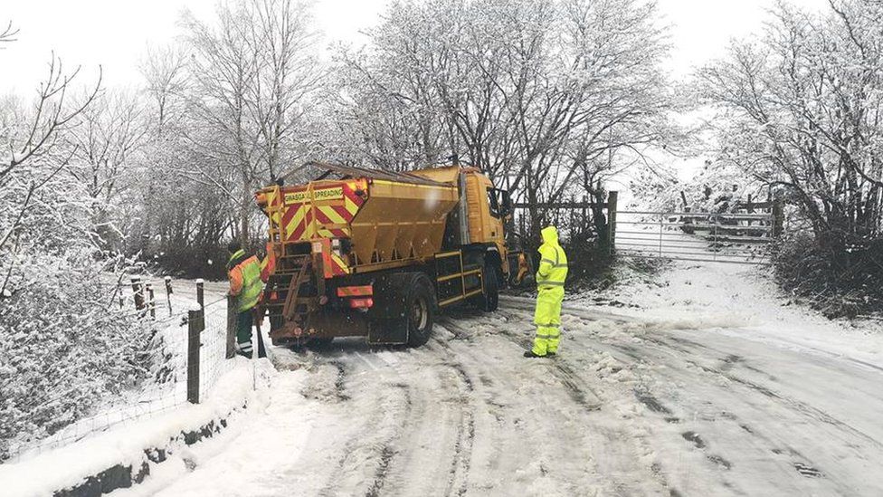 A gritter blocking the road