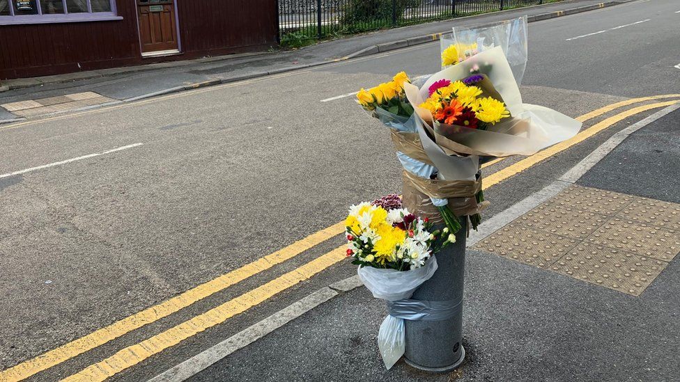 Flowers were left in Burry Port after Mr Ormerod's death