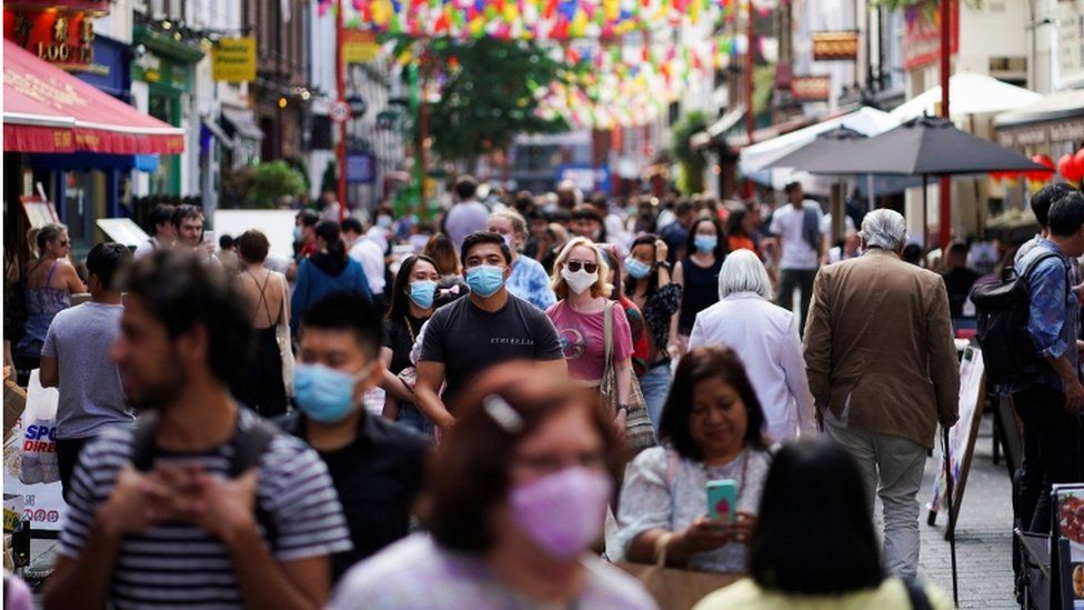 People walking through London's Chinatown