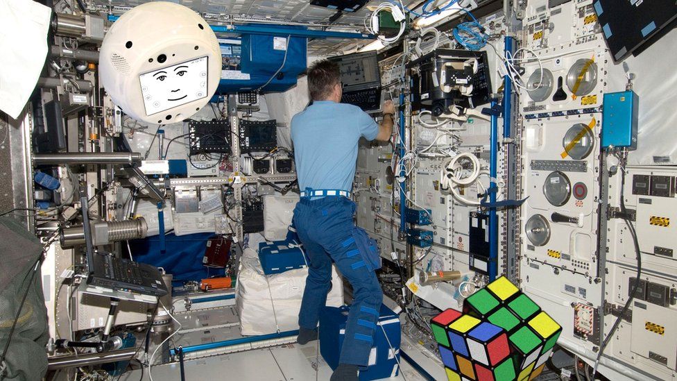 A mock-up image of the robot floating in the ISS