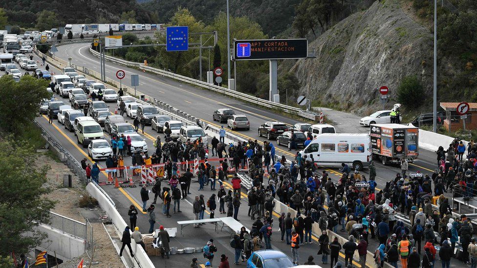 Protesters block the AP-7 motorway at the Spanish-French border in La Jonquera, northern Spain, 11 November 2019