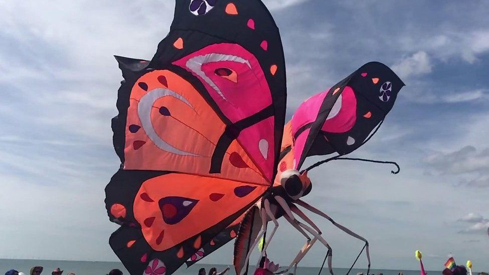 A giant butterfly in the Pride parade