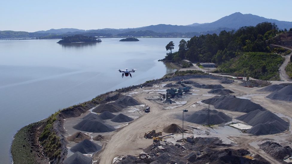 Drone flying above building site