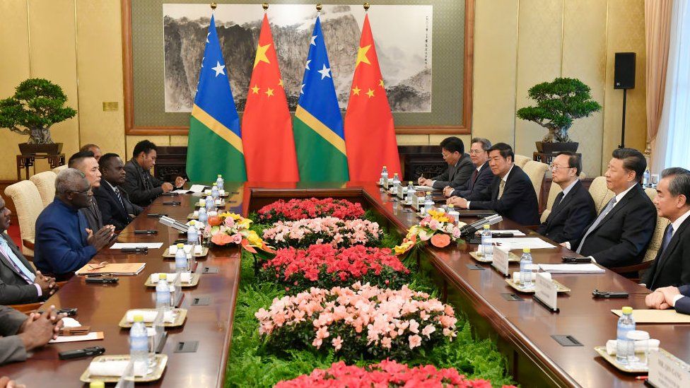 Solomon Islands' PM Sogavare (3rd left) in a meeting Chinese President Xi Jinping (1st right) in Beijing in 2019