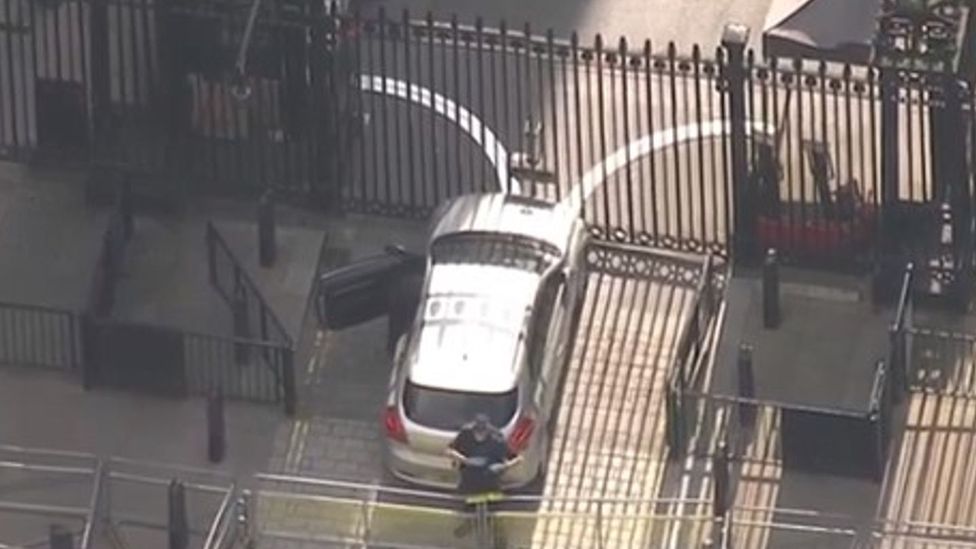 A car parked at the gates of Downing Street