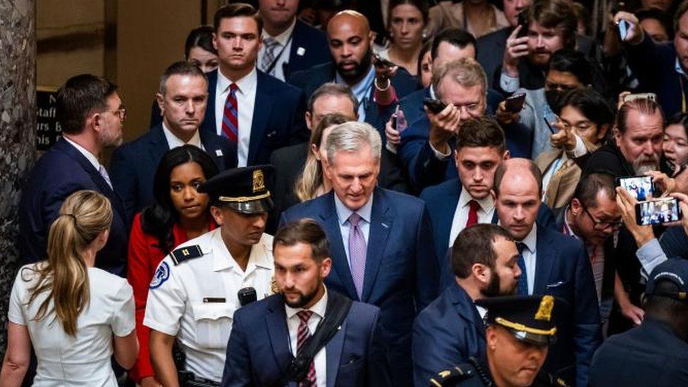 Former House Speaker Kevin McCarthy leaves the chamber after historic vote