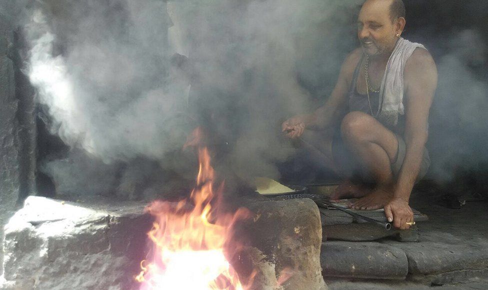 A man making sweets in a shop in Phalodi