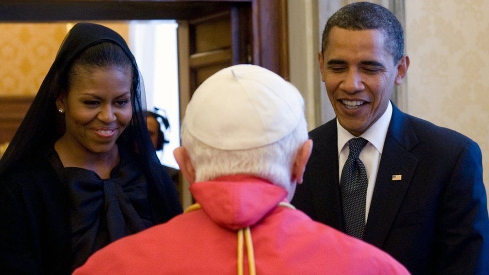 Pope Benedict XVI speaks to US President Barack Obama (R) and US First Lady Michelle Obama during an audience on 10 July 2009 at The Vatican
