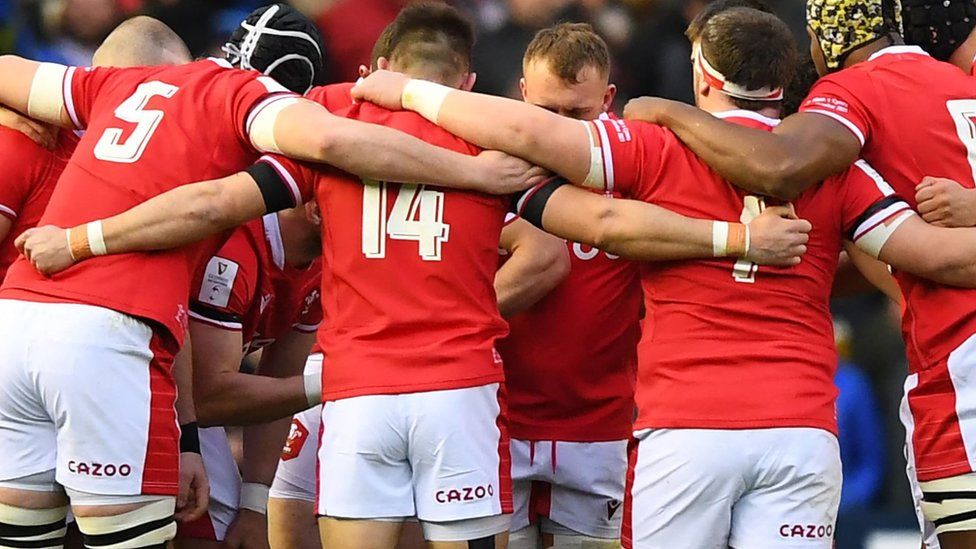 Wales players in a huddle before they take on Scotland in the Six Nations
