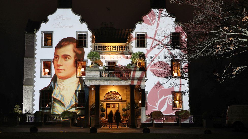A portrait of Robert Burns is projected on to the front of Prestonfield House in Edinburgh on Burns Night, 25 January 2018