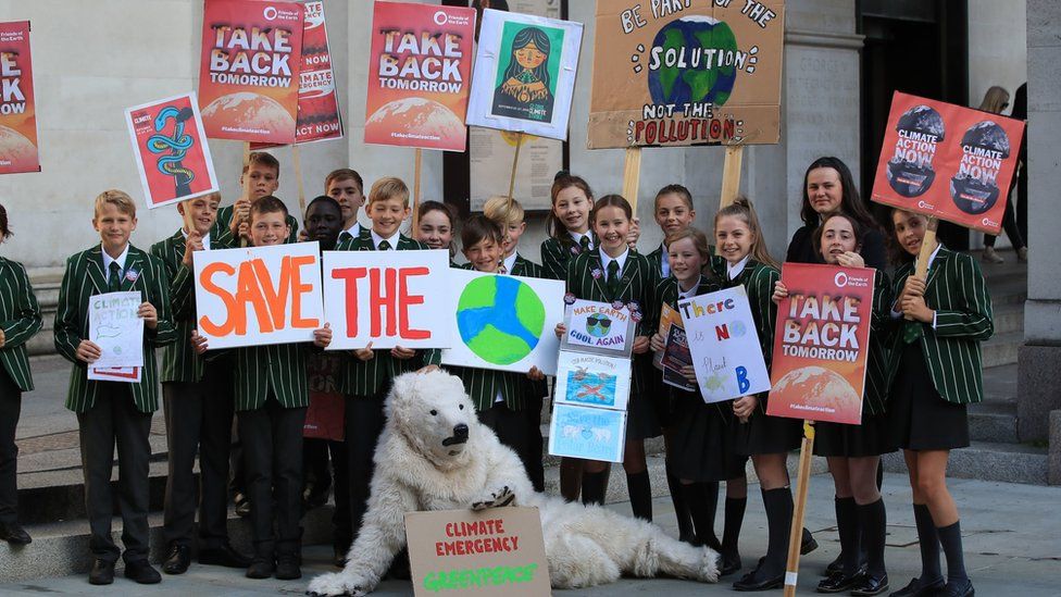 Children from Terra Nova Secondary in Cheshire attend the UK Student Climate Network's strike in Manchester