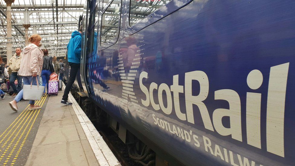 passengers mounting train