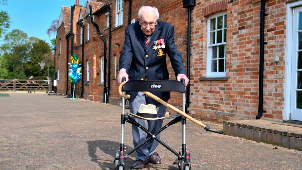 Captain Sir Tom Moore walking at his family home to raise money for the NHS