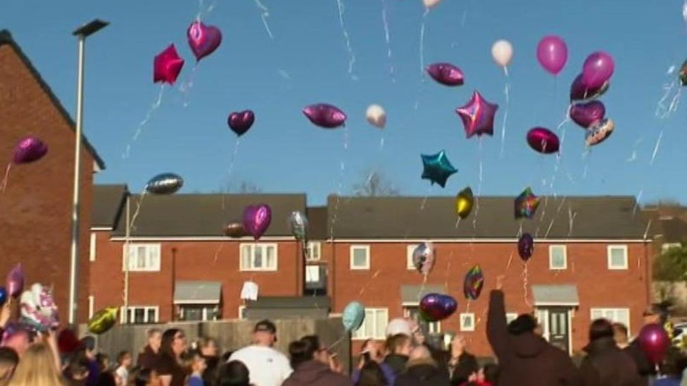 Balloons being released into the air
