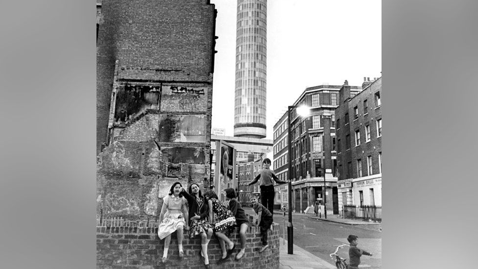 Children playing in front of the Post Office Tower, later the BT Tower, in London, 1965