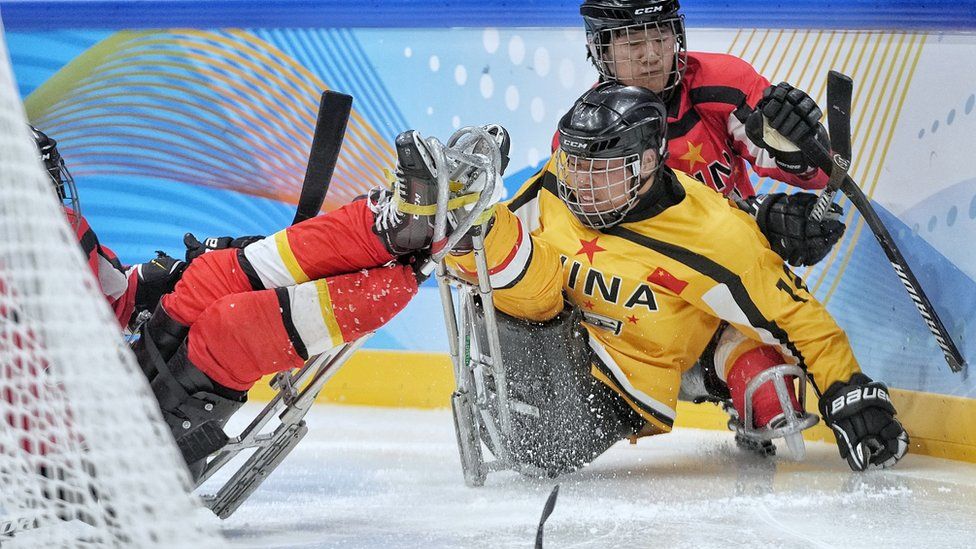 Chinese players collide in the Para Ice Hockey test