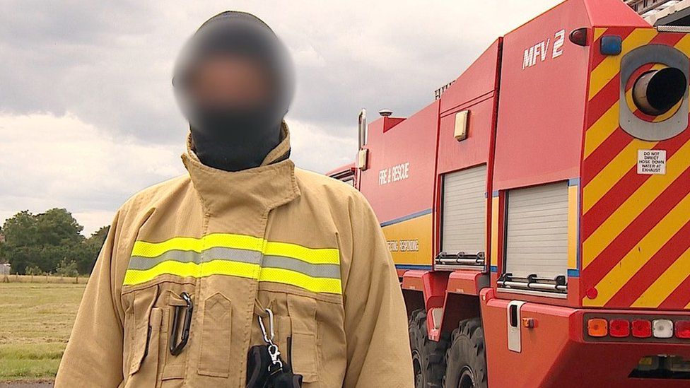 Blurred image op-sec'd (approved for use by MOD) of a senior Ukrainian military firefighter