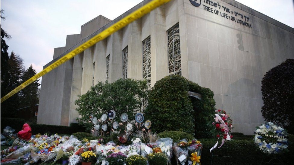 Flowers placed at memorials outside of the Tree of Life synagogue in Pittsburgh