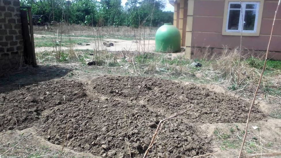 Freshly dug graves in Umogidi, Nigeria