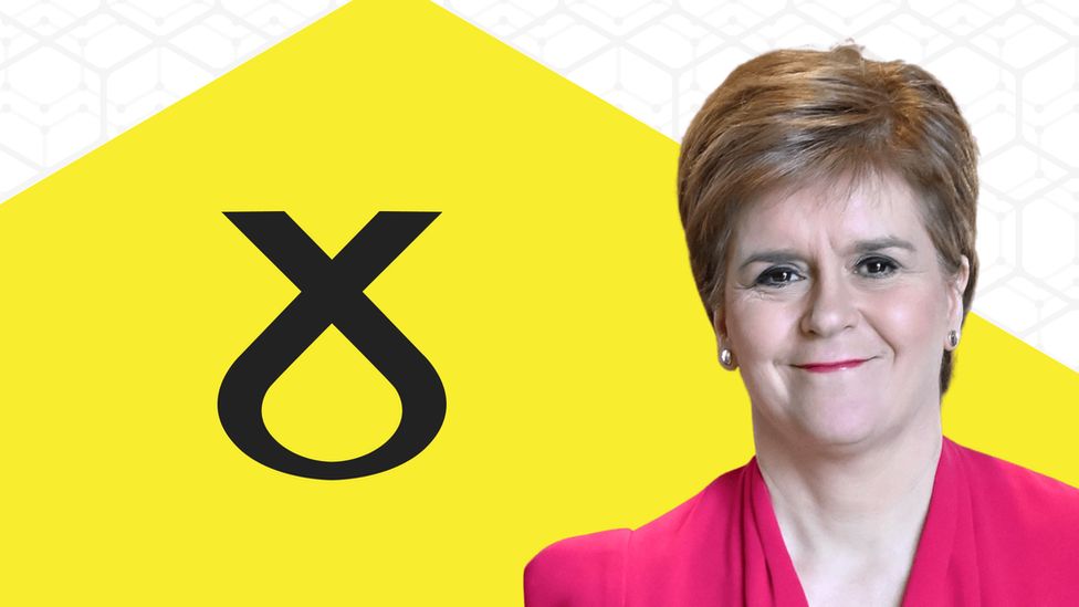 Leader Nicola Sturgeon appears in front of SNP banner