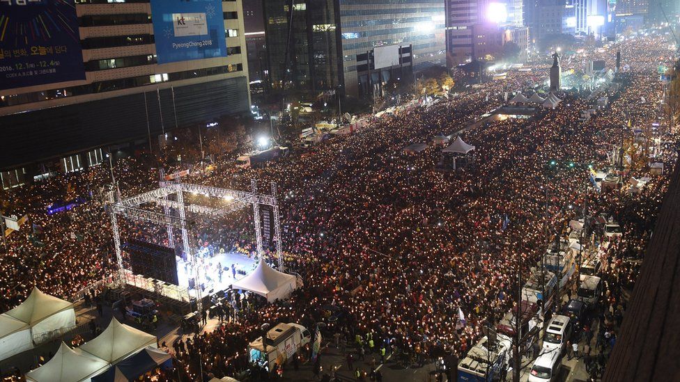 A view down on tens of thousands of people protesting in Seoul