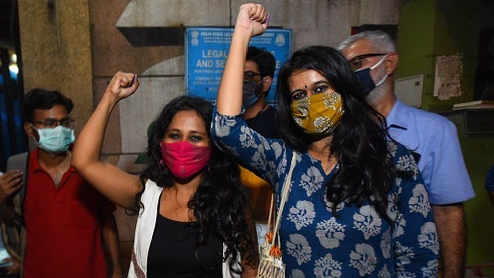 Student activists Natasha Narwal and Devangana Kalita outside Tihar prison, in New Delhi
