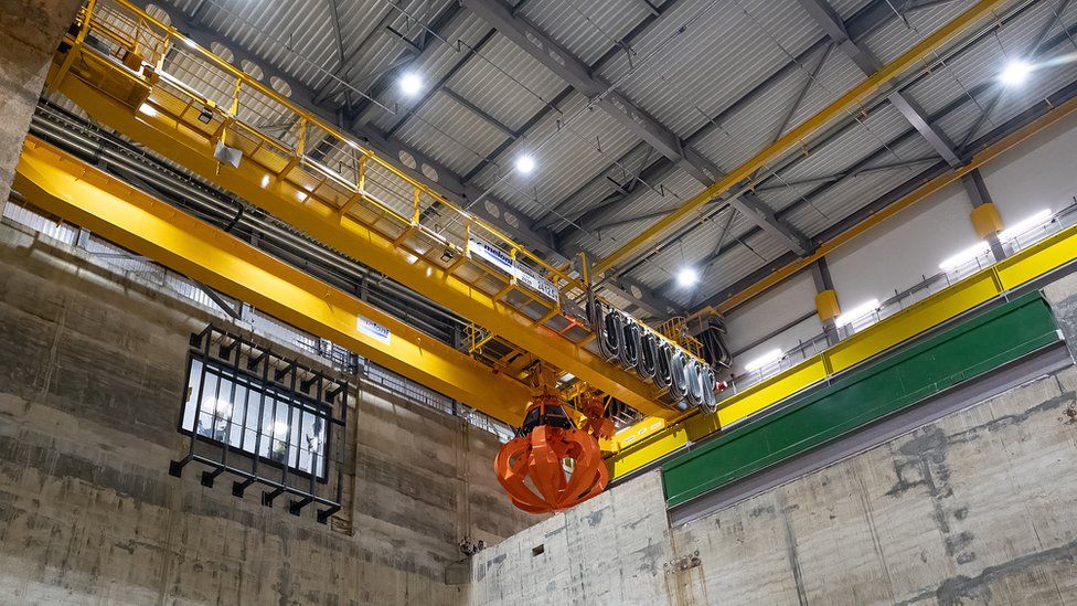 The inside of the Rookery South Energy Recovery Facility, showing the grabber that picks up the waste