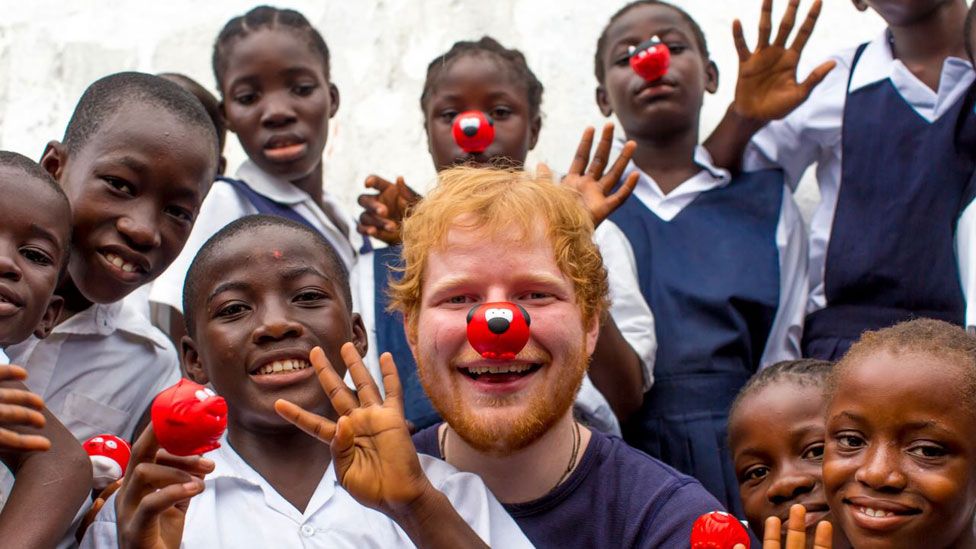 Ed Sheeran with Liberian children in Monrovia