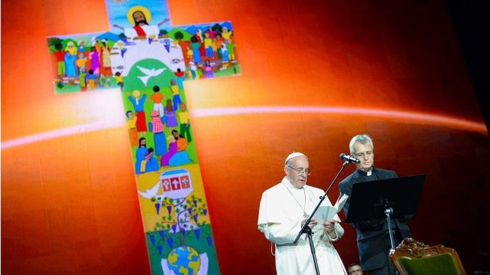 Pope Francis (L) speaks during an ecumenical event at the Malmo Arena on October 31, 2016 in Malmo, Sweden